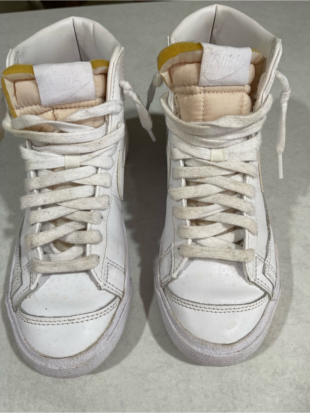 Nike Women’s White and Cream High-Top Sneakers